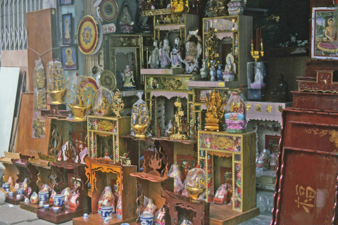 Hanoi storefront displaying statues and other supplies for ancestral altars