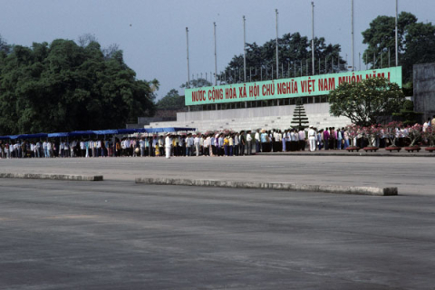 Hundreds of visitors wait in long lines to enter Ho Chi Minh's mausoleum