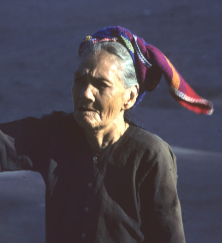 Elderly woman with colorful headscarf at Nha Trang