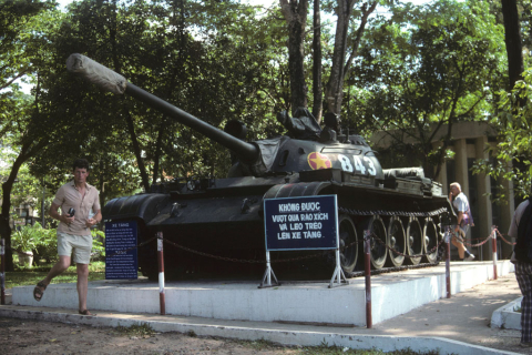 Tank monument and tourists at Reunification Palace in Ho Chi Minh City