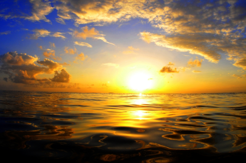 Sun setting on the ocean